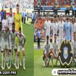 Starting XI Benfica & Auckland City berpose untuk foto tim