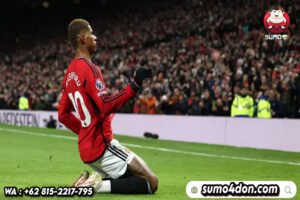 Pemain Manchester United, Marcus Rashford melakukan selebrasi setelah mencetak gol